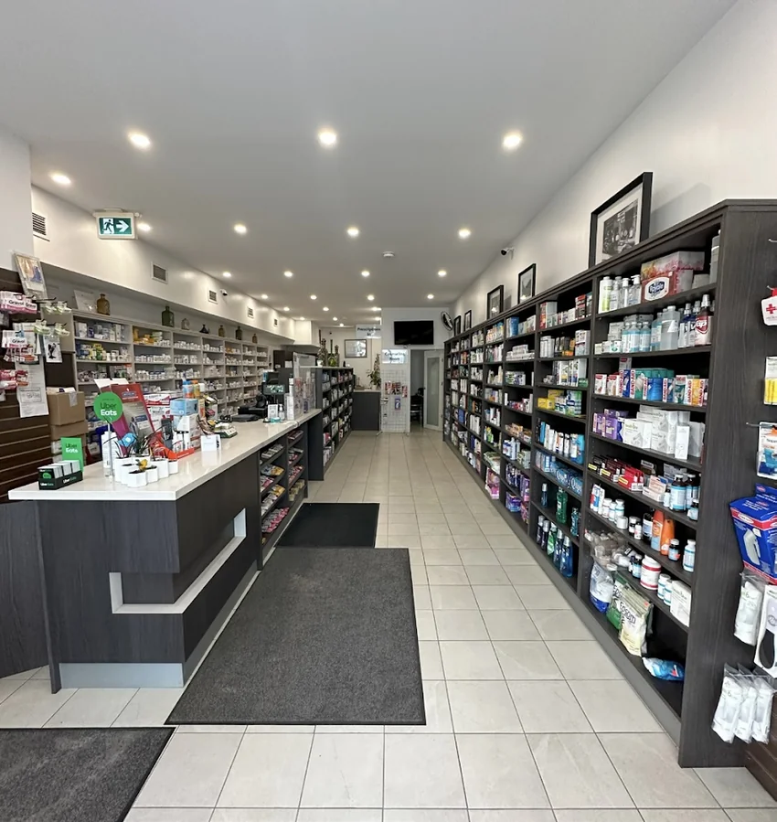 Inside St. Clair Drug Mart Pharmacy — pharmacy counter and full store